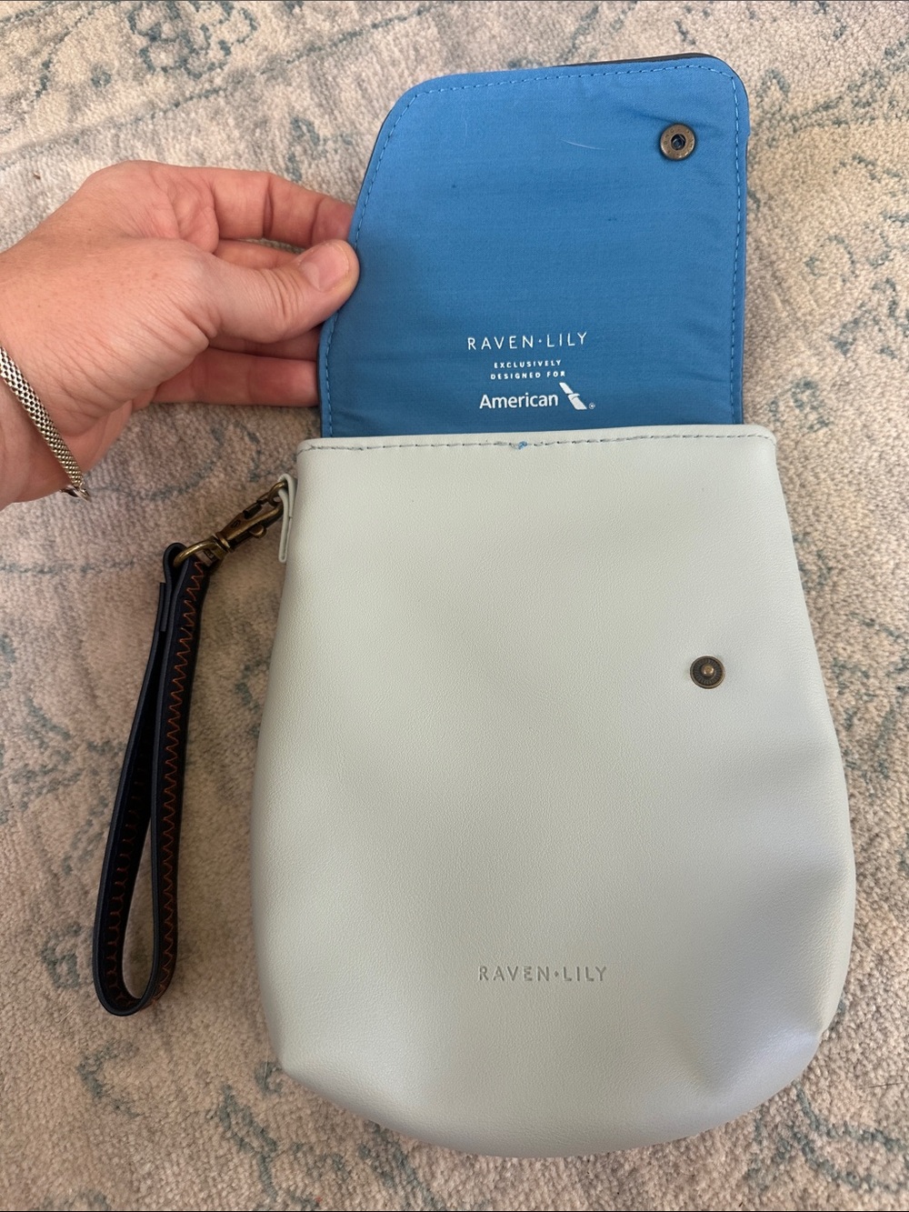 Raven + Lily Pale Blue Wristlet  American Airlines flagship bag